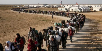 Refugee families seeking safety, highlighting the global displacement crisis
